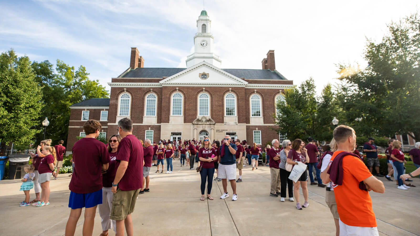 students and families wearing EKU T-shirts outside the Keen Johnson Building